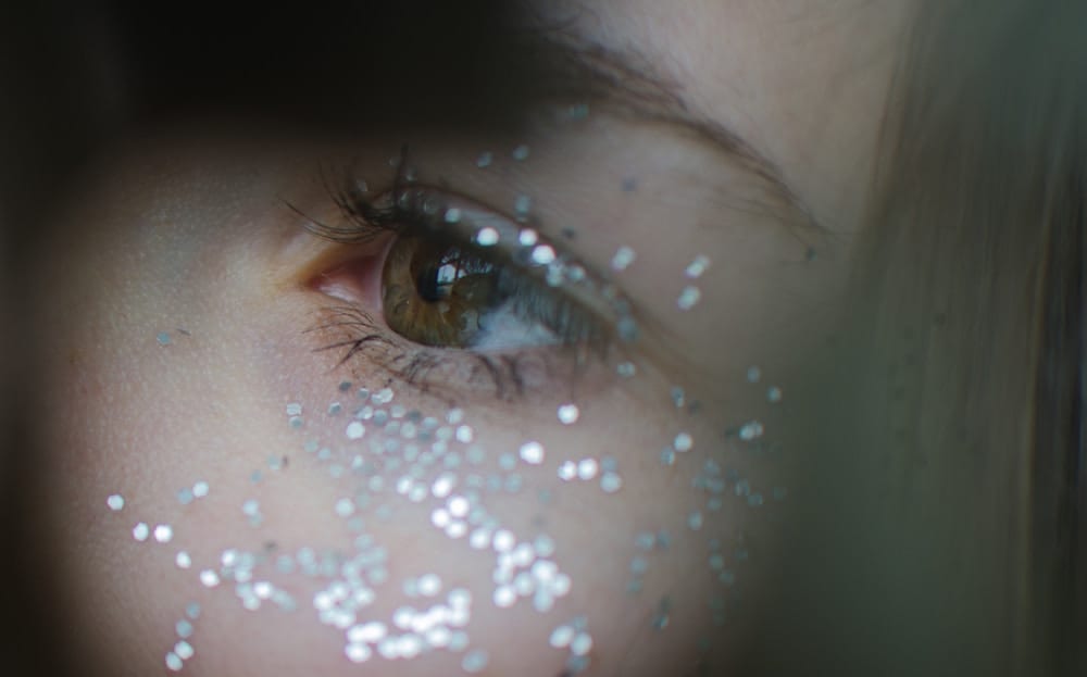glitter around a womans eye
