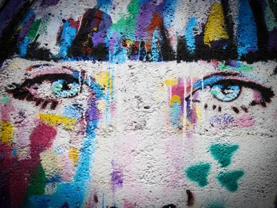 olorful graffiti painting of a beautiful woman's eyes